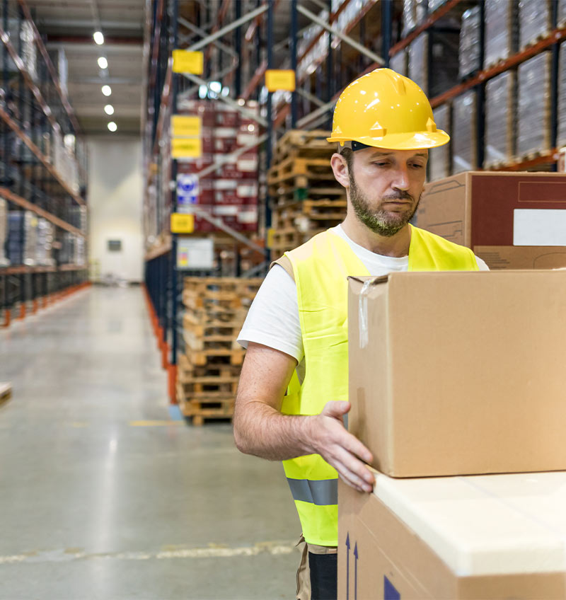 man working in logistics warehouse